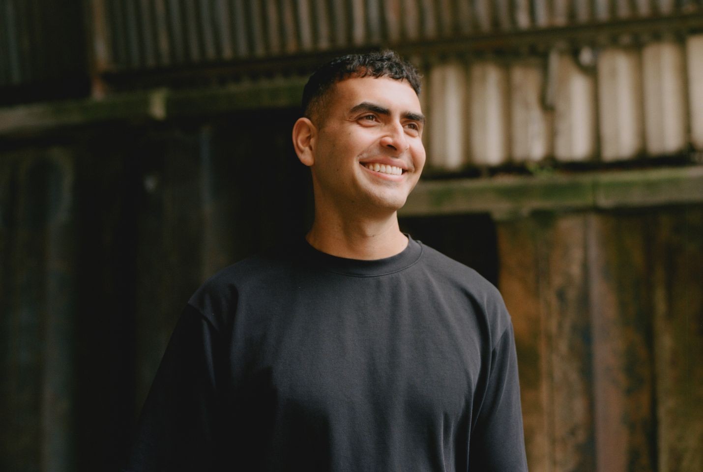Sammy Virji wearing a black tshirt